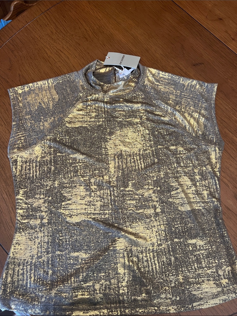 EE some  brand metallic gold shirt